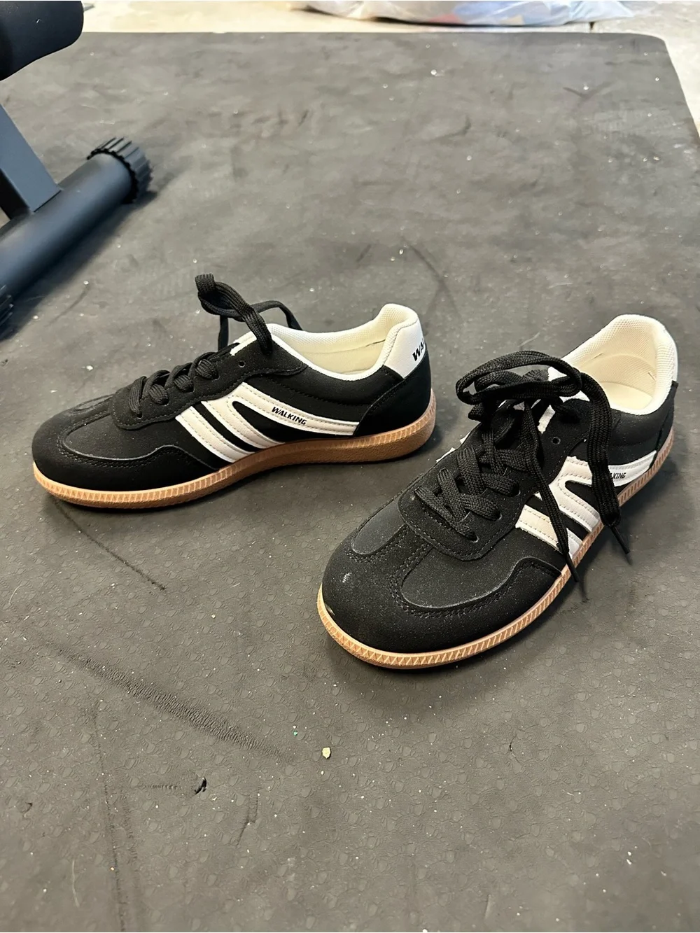 Women’s Black and White casual walking shoes with brown rubber sole